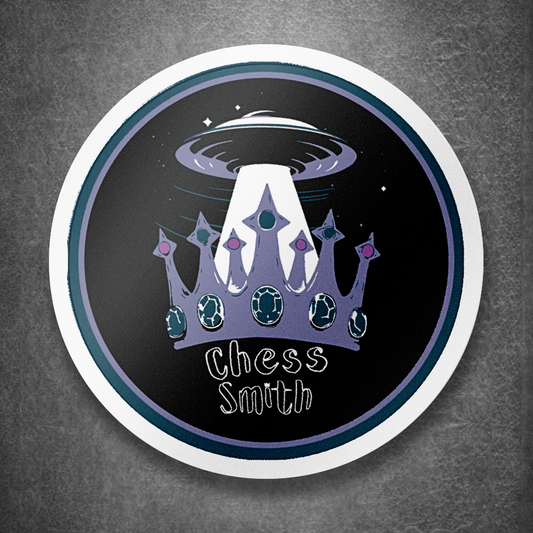 Sticker with a UFO and crown design on a dark background