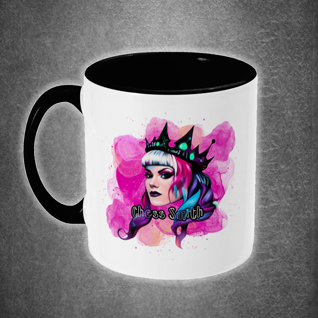 Mug with a colorful design of a person with pink hair and a crown on a gray background