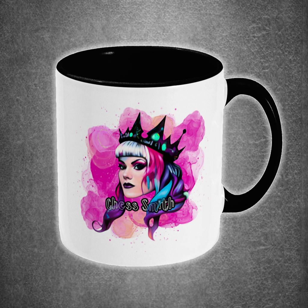Mug with a colorful graphic of a person with a crown and pink accents on a gray background